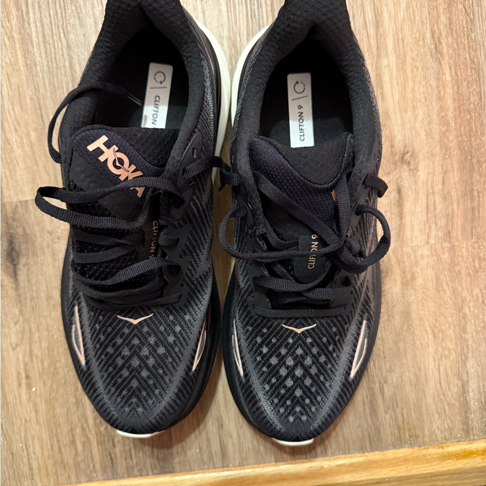 NEW! Hoka Clifton 9 Black and Gold Sneakers - Picture 4 of 5